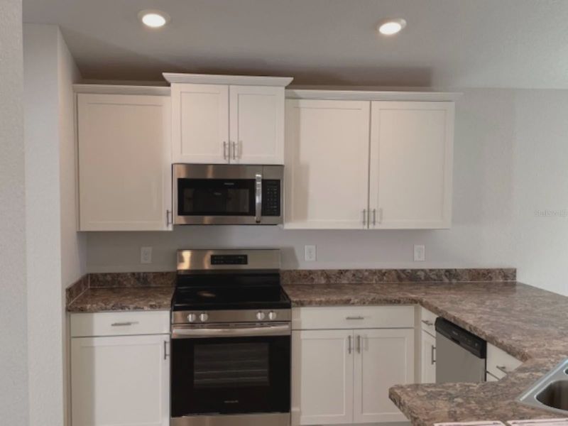 Furnished interior view inside a new home in Oak Hill Plantation, Ocala (Image 5).