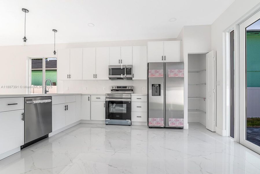 Furnished interior view inside a new home in , Dania Beach (Image 11). Furnished interior view inside a new home in , Dania Beach (Image 11).