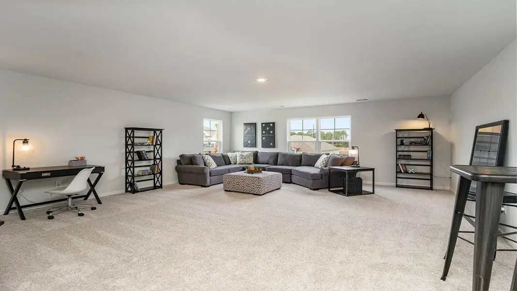 Representative furnished interior of a home built from the Tillman by D.R. Horton in The Preserve at Shaftesbury Glen, Conway (Image 14).