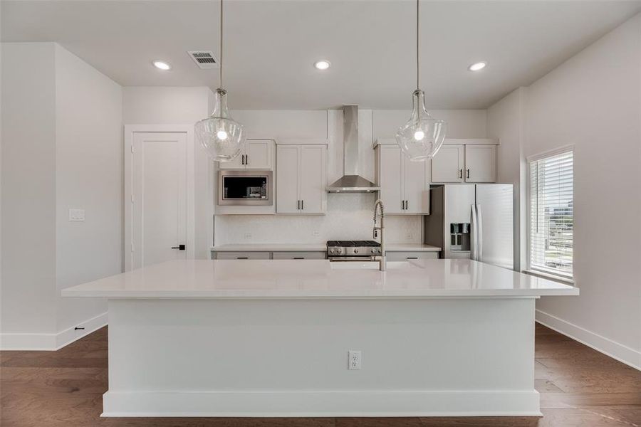 Furnished interior view inside a new home in Collin Creek, Plano (Image 5).