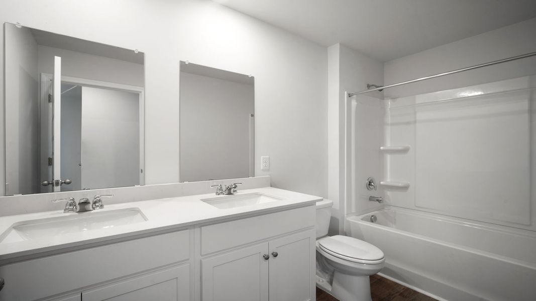 Furnished interior view inside a new home in The Lakes at North Glynn, Brunswick (Image 28).