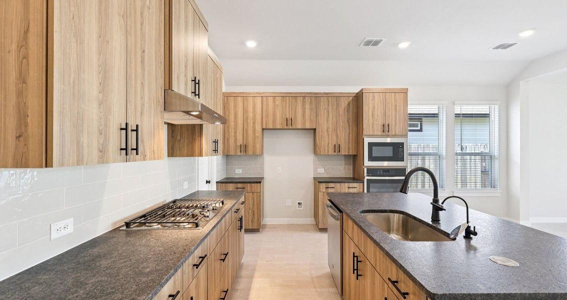 Furnished interior view inside a new home in Trace, San Marcos (Image 8).