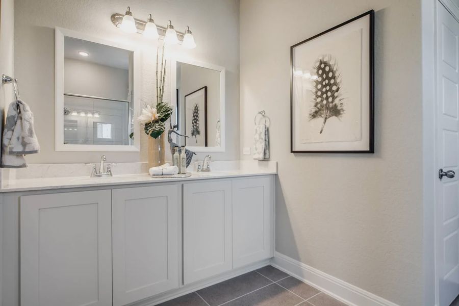 Representative furnished interior of a home built from the Charleston by Chesmar Homes in Stillwater Ranch, Buda (Image 12).