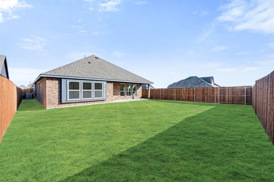 Exterior details and patio area of a home in Georgetown at Kings Fort, Kaufman (Image 25).