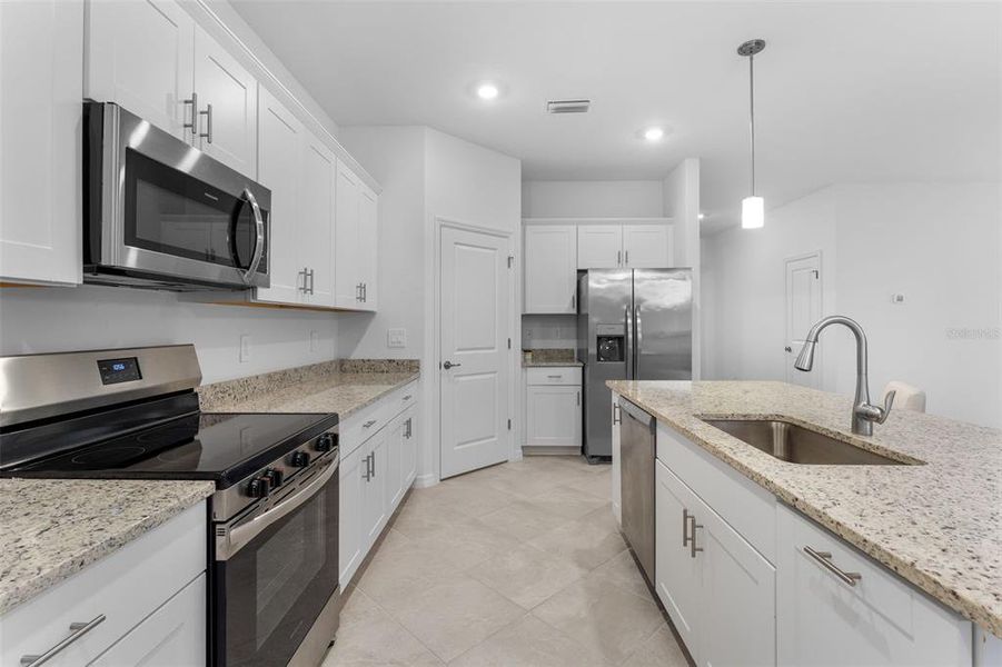 Furnished interior view inside a new home in , Port Charlotte (Image 9).