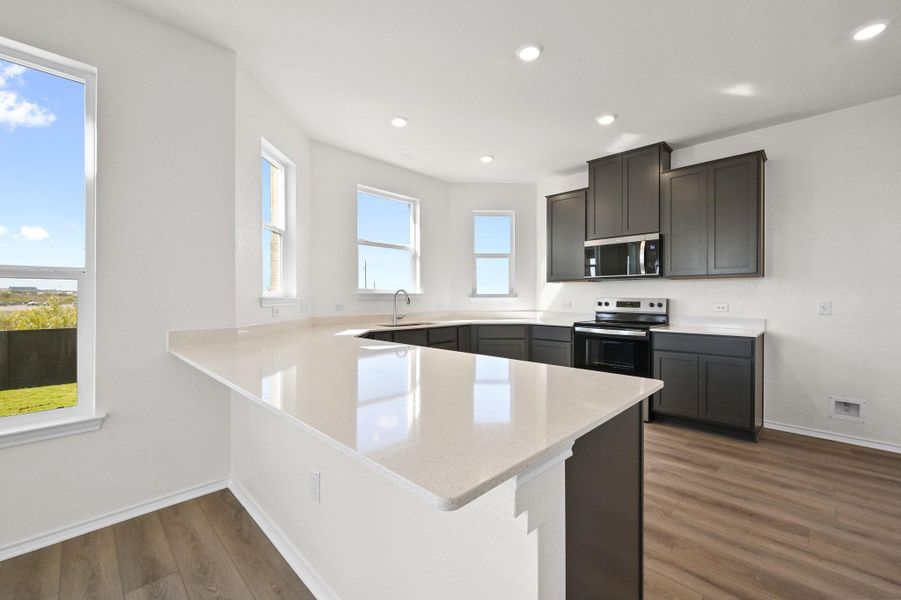 Furnished interior view inside a new home in Stoney Chase, Del Valle (Image 8).