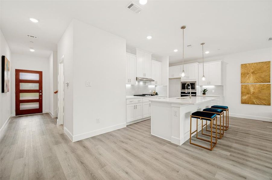 Furnished interior view inside a new home in , The Colony (Image 13).