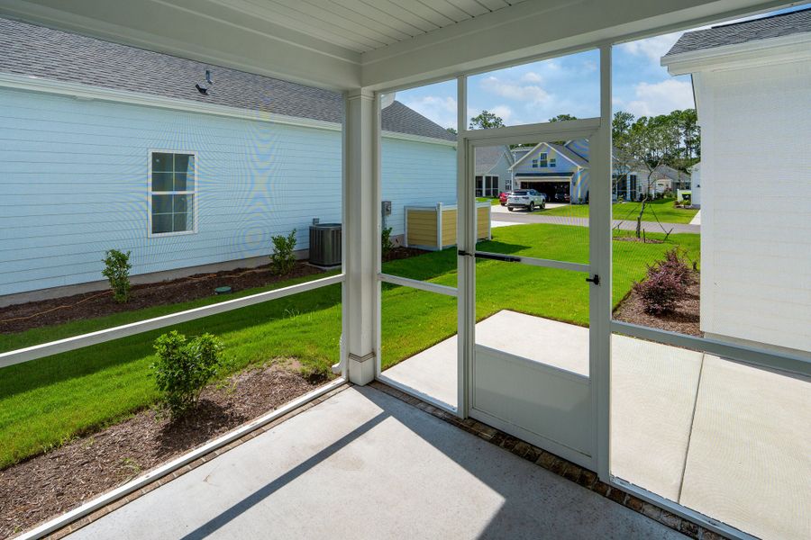 Front exterior of a new home in Osprey Landing, Southport, NC, highlighting curb appeal (Image 29).