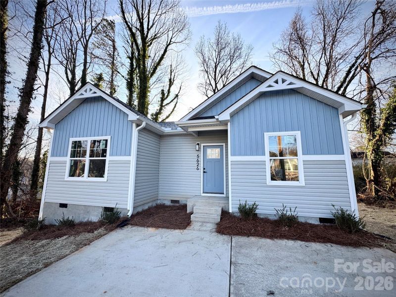 Front exterior of a new home in , Charlotte, NC, highlighting curb appeal (Image 2). Front exterior of a new home in , Charlotte, NC, highlighting curb appeal (Image 2).