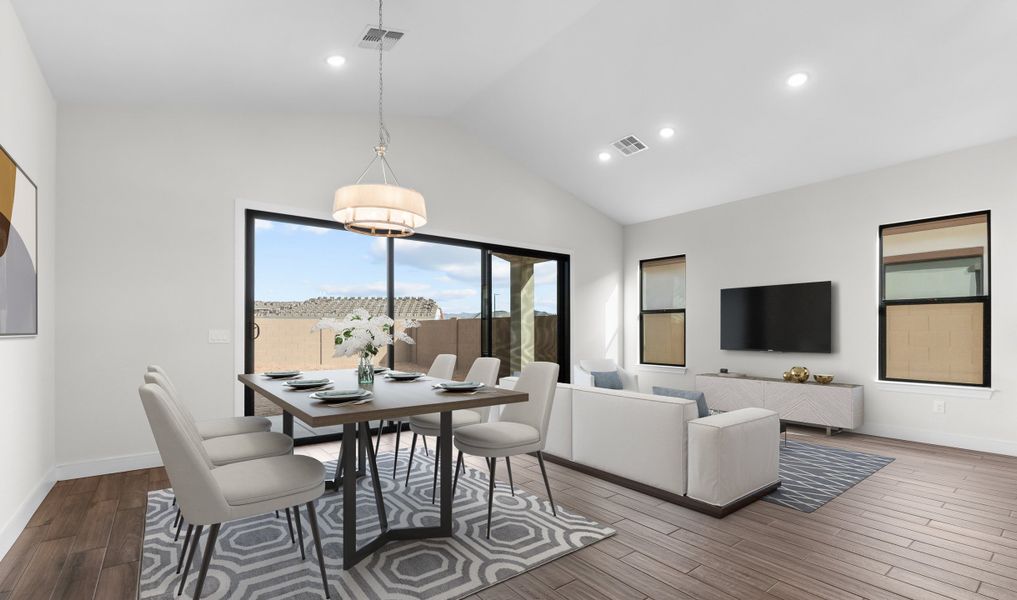 Dining area with vaulted ceiling