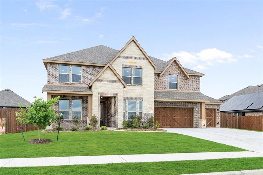 Front exterior of a new home in Homestead at Daniel Farms, DeSoto, TX, highlighting curb appeal (Image 26). Front exterior of a new home in Homestead at Daniel Farms, DeSoto, TX, highlighting curb appeal (Image 26).