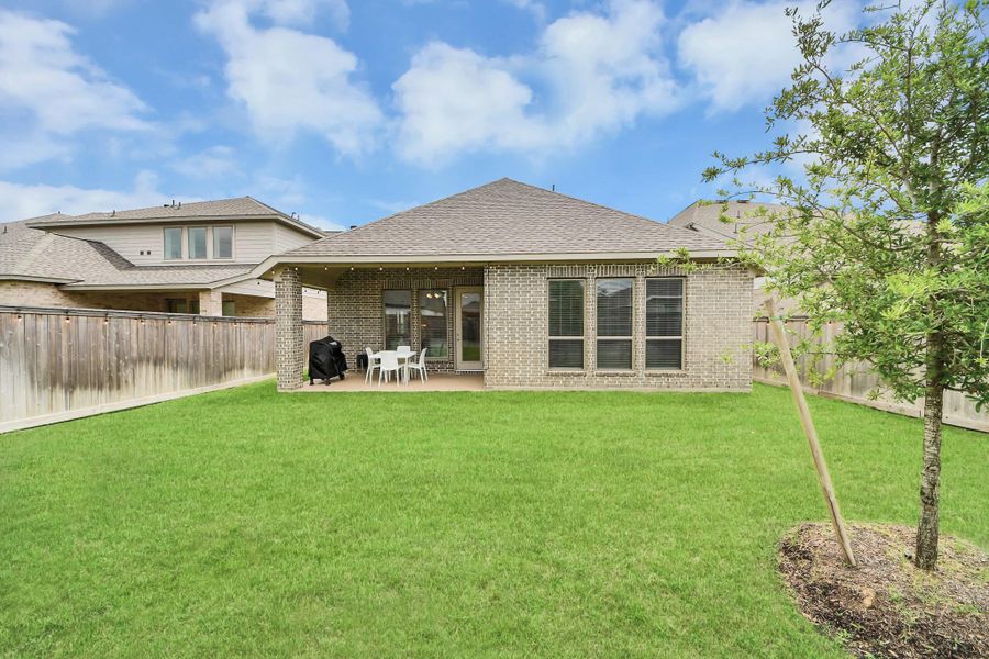 Exterior details and patio area of a home in Bridgeland, Cypress (Image 27). Exterior details and patio area of a home in Bridgeland, Cypress (Image 27).