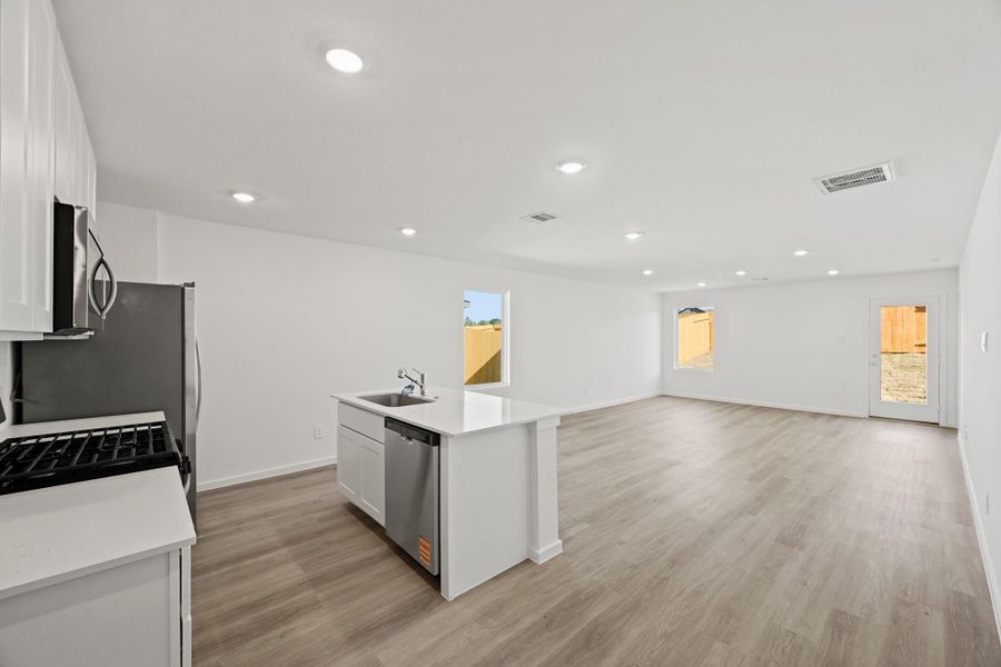 Furnished interior view inside a new home in Sunterra, Katy (Image 4).