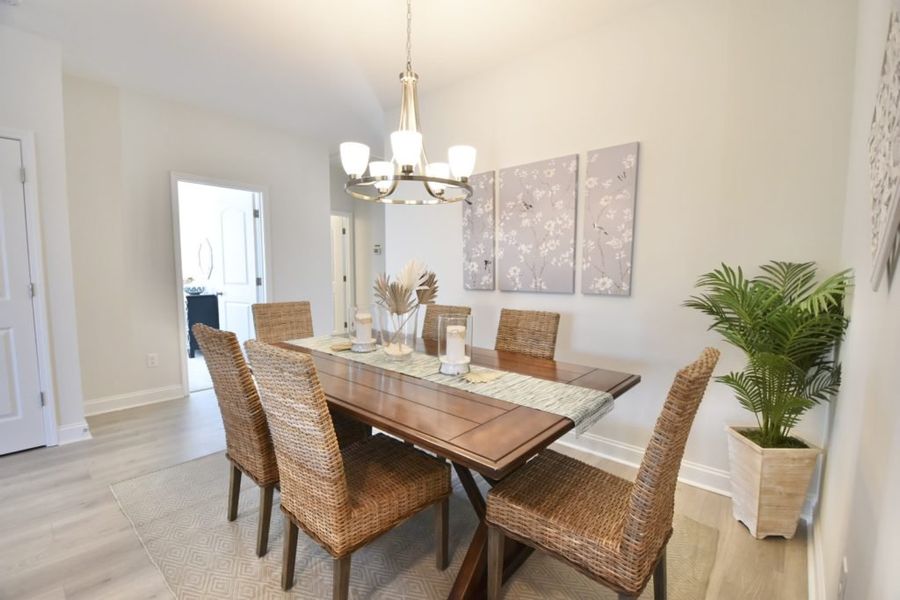 Representative furnished interior of a home built from the Isla by Stevens Fine Homes in Parkwood Estates, Leland (Image 7).
