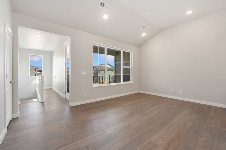 Spacious, unfurnished interior of a new home in The Lakes at Centerra - Discovery, Loveland (Image 13). Spacious, unfurnished interior of a new home in The Lakes at Centerra - Discovery, Loveland (Image 13).