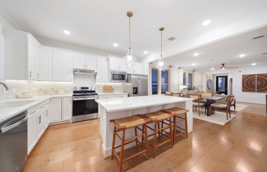 Representative furnished interior of a home built from the Flagstone by DiVosta in BeachWalk by Manasota Key, Englewood (Image 5).
