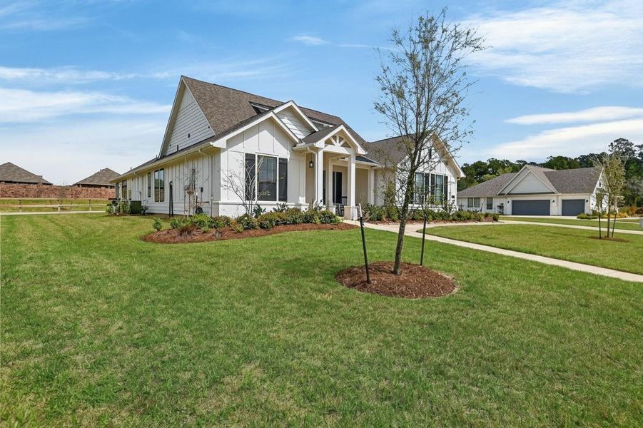 Front exterior of a new home in Lone Star Landing, Montgomery, TX, highlighting curb appeal (Image 23).