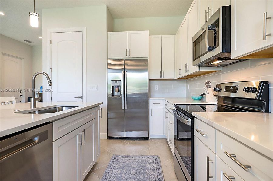 Furnished interior view inside a new home in , Palm City (Image 15).