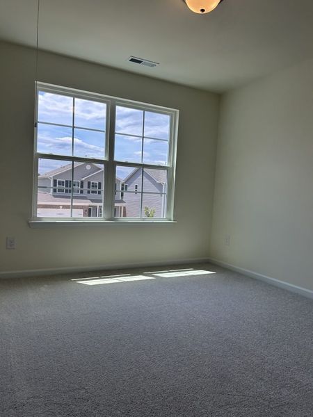 Spacious, unfurnished interior of a new home in The Wilcox, Greensboro (Image 20).