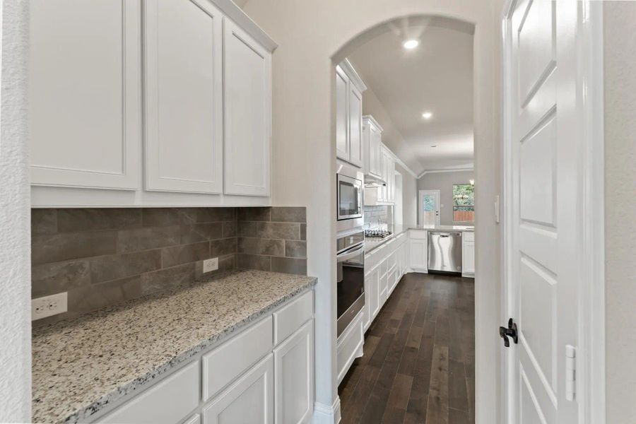 Kitchen | Concept 2533 at Mockingbird Hills in Joshua, TX by Landsea Homes