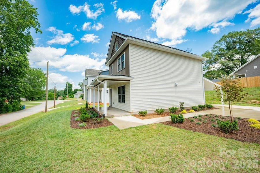 Exterior details and patio area of a home in , Spindale (Image 18).