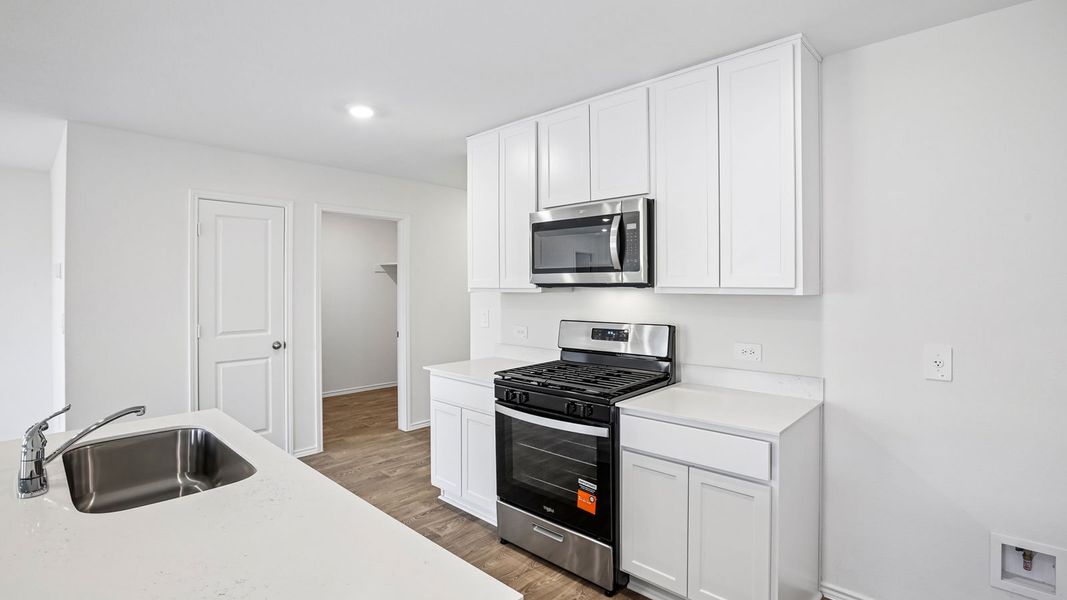 Furnished interior view inside a new home in Talavera, Kyle (Image 8).