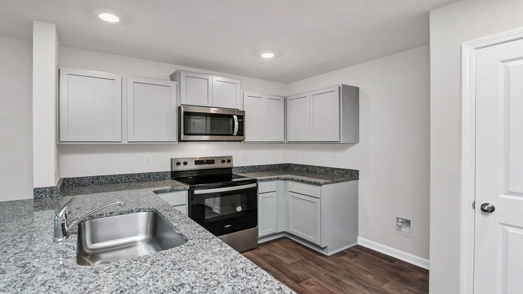 Furnished interior view inside a new home in Hunter's Branch Townhomes, Hopkins (Image 5).
