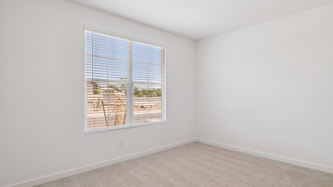 Spacious, unfurnished interior of a new home in Zanjero Pass, Waddell (Image 22).