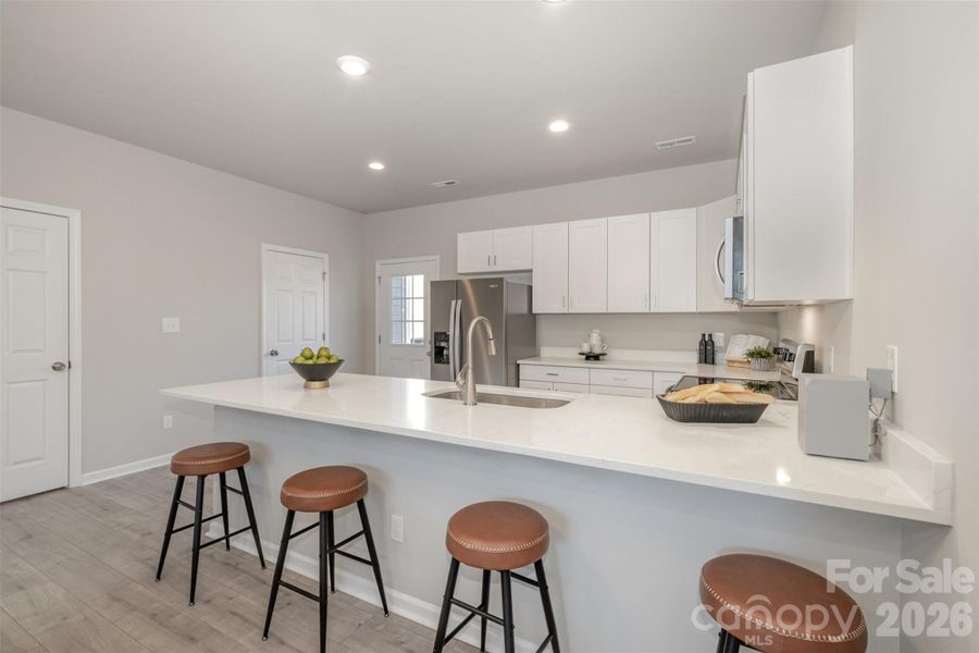 Furnished interior view inside a new home in , Concord (Image 28).