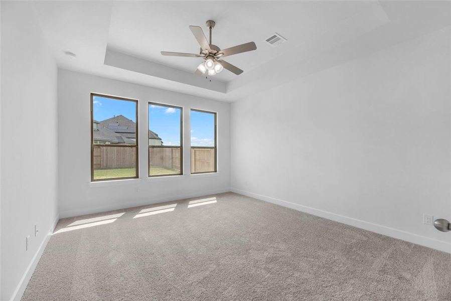 Spacious, unfurnished interior of a new home in Sunterra, Katy (Image 16).