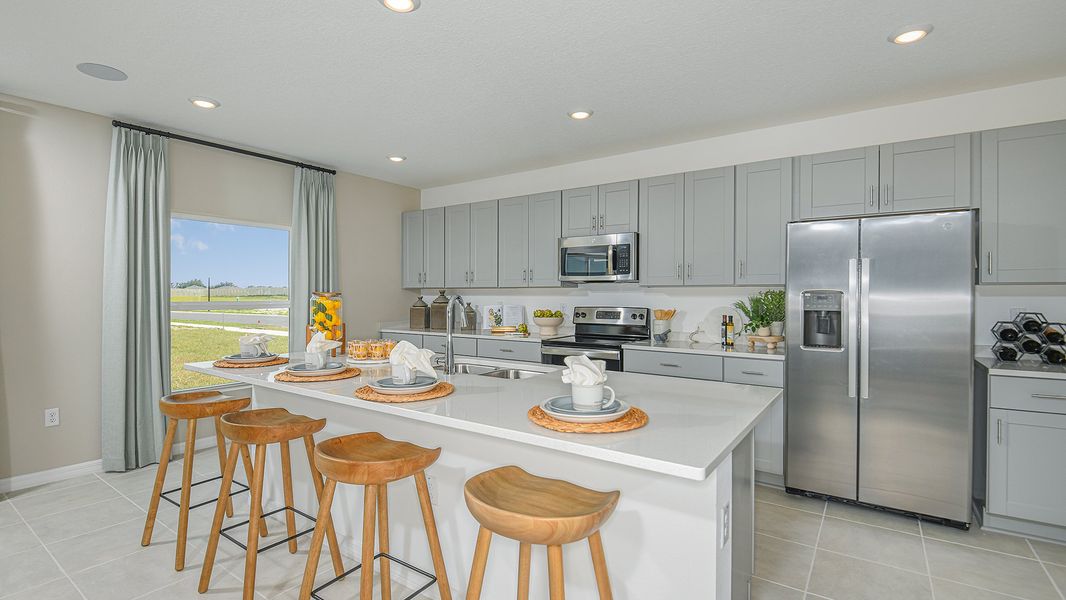 Representative furnished interior of a home built from the Cardinal by Taylor Morrison in Solena, North Fort Myers (Image 7).