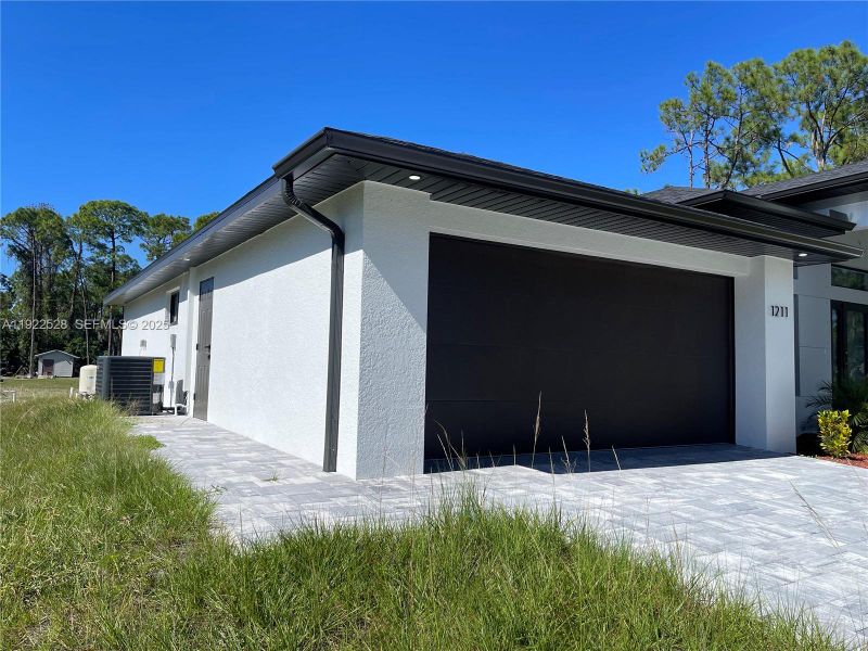 Exterior details and patio area of a home in , Lehigh Acres (Image 28). Exterior details and patio area of a home in , Lehigh Acres (Image 28).