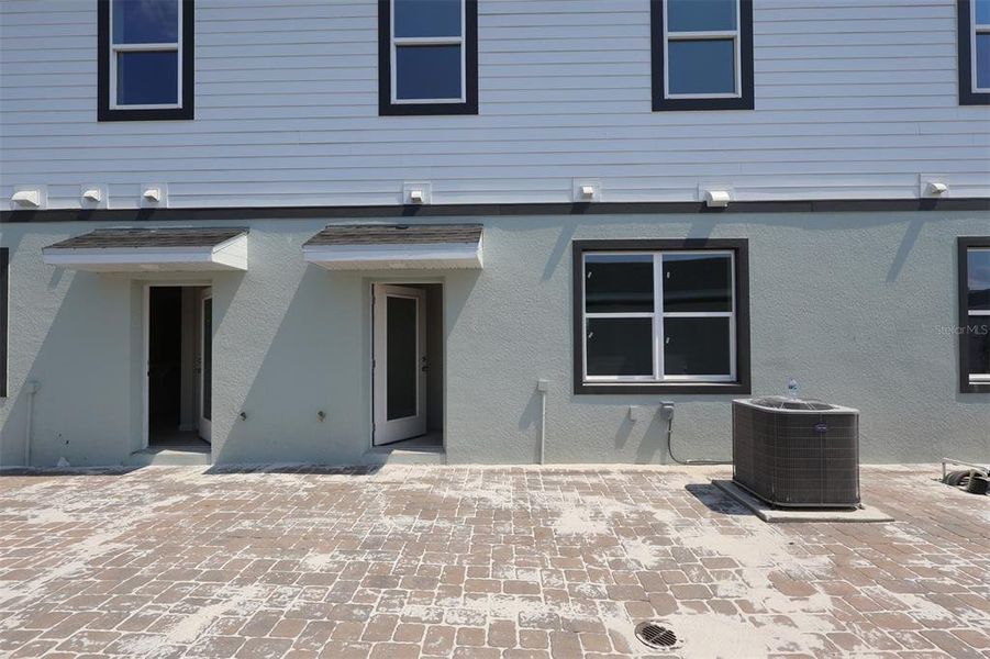 Exterior details and patio area of a home in Center Lake on the Park, St. Cloud (Image 13).