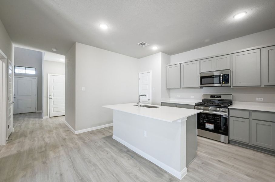 Kitchen in the Willow home plan by Trophy Signature Homes – REPRESENTATIVE PHOTO Kitchen in the Willow home plan by Trophy Signature Homes – REPRESENTATIVE PHOTO