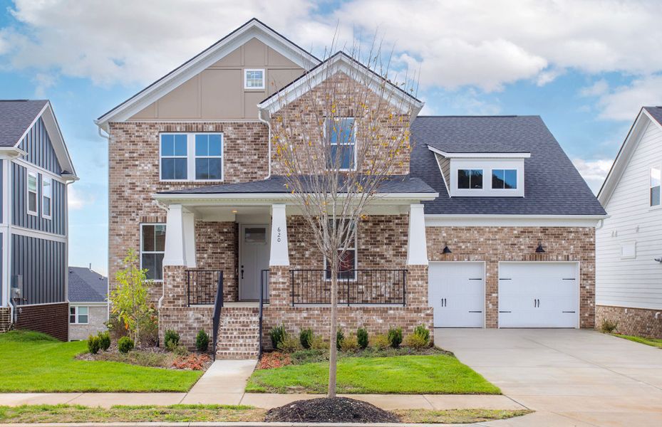 Front exterior of a new home in Durham Farms, Hendersonville, TN, highlighting curb appeal (Image 27).