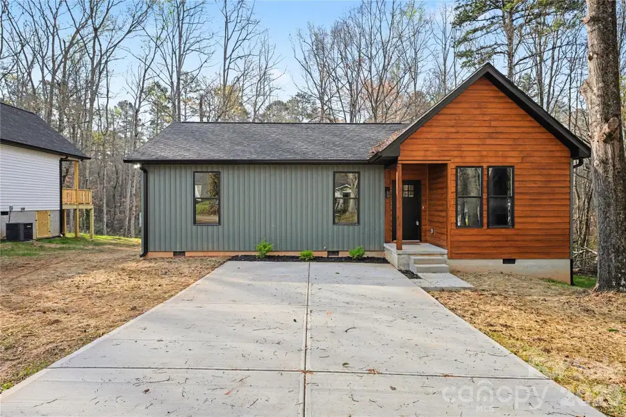 Front exterior of a new home in , Cherryville, NC, highlighting curb appeal (Image 1). Front exterior of a new home in , Cherryville, NC, highlighting curb appeal (Image 1).