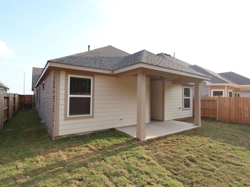 Front exterior of a new home in Sorella, Tomball, TX, highlighting curb appeal (Image 16). Front exterior of a new home in Sorella, Tomball, TX, highlighting curb appeal (Image 16).