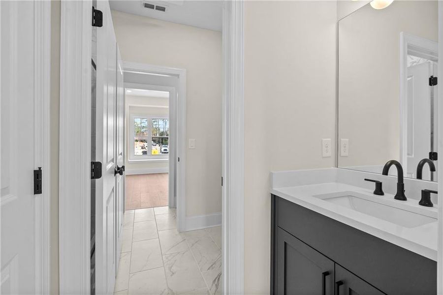 Furnished interior view inside a new home in Bellwyn, Johns Creek (Image 8).