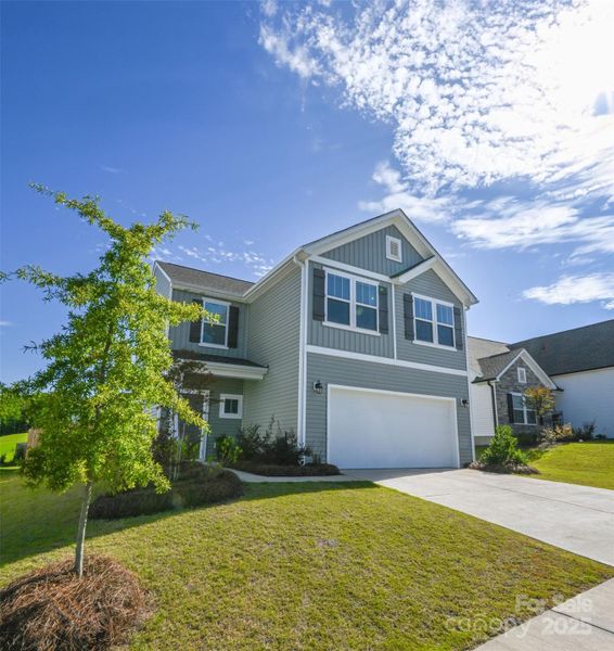 Front exterior of a new home in , Mount Holly, NC, highlighting curb appeal (Image 23).