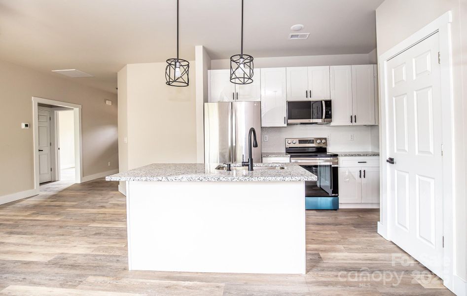 Furnished interior view inside a new home in , Hickory (Image 4).