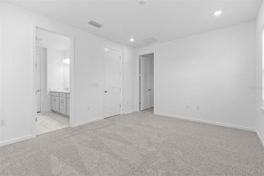 Spacious, unfurnished interior of a new home in Serenade at Ovation, Winter Garden (Image 16). Spacious, unfurnished interior of a new home in Serenade at Ovation, Winter Garden (Image 16).