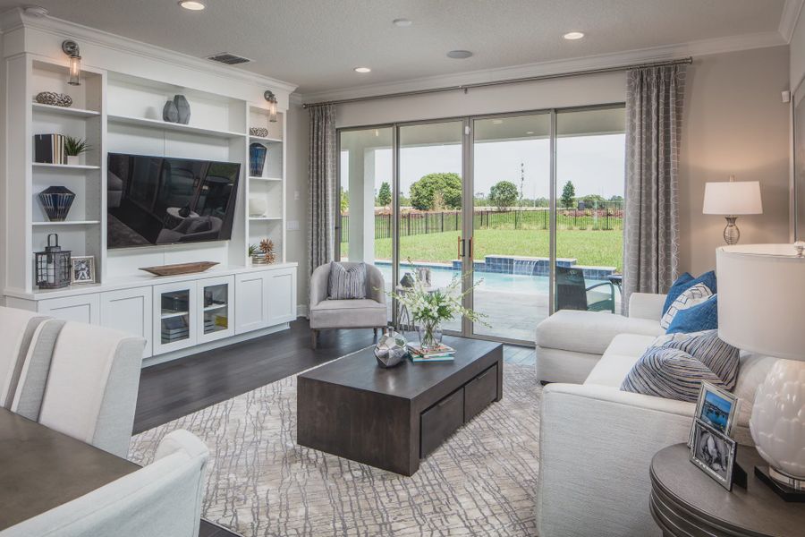 Representative furnished interior of a home built from the Tarpon II by Jones Homes USA in Reserve at Twin Lakes, St. Cloud (Image 2).