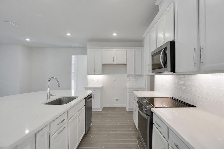 Furnished interior view inside a new home in Seaire, Parrish (Image 14).