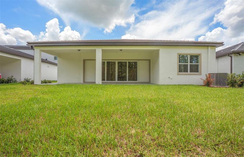 Exterior details and patio area of a home in Two Rivers, Zephyrhills (Image 3).