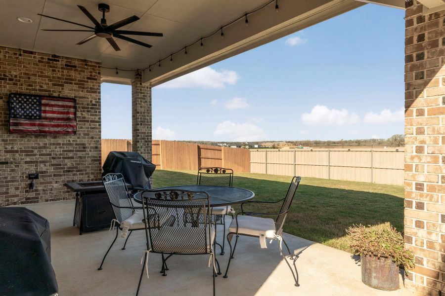 Exterior details and patio area of a home in The Colony, Bastrop (Image 23).