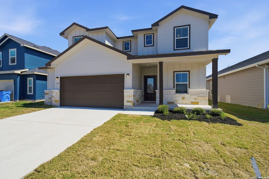 Front exterior of a new home in Swenson Heights, Seguin, TX, highlighting curb appeal (Image 18). Front exterior of a new home in Swenson Heights, Seguin, TX, highlighting curb appeal (Image 18).