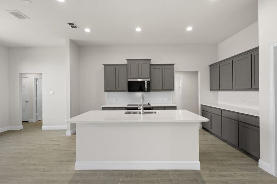 Front exterior of a new home in Still Water Lake, Godley, TX, highlighting curb appeal (Image 7). Front exterior of a new home in Still Water Lake, Godley, TX, highlighting curb appeal (Image 7).