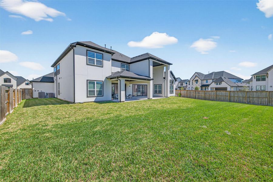 Exterior details and patio area of a home in , Missouri City (Image 29).
