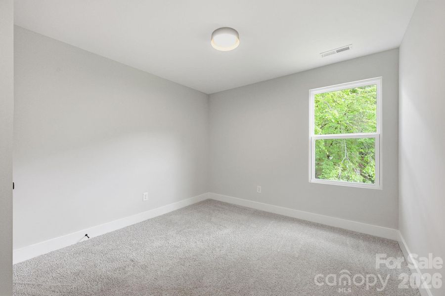 Spacious, unfurnished interior of a new home in , Albemarle (Image 11).