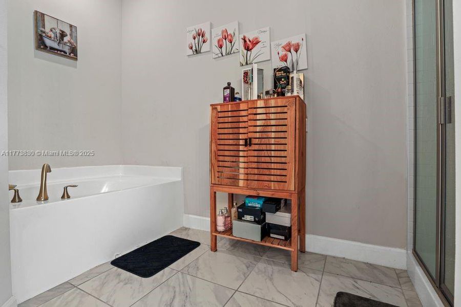 Furnished interior view inside a new home in Waterstone 62, Fort Pierce (Image 22).